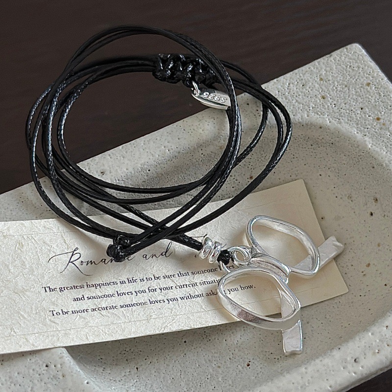 Wholesale 925 Sterling Silver Hollow Bow Pendant Necklace with Black Leather Cord